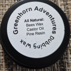 Container of all-natural Greenhorn Adventures dyeing wax.